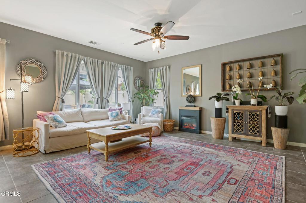 652 Xanadu Way Oxnard, CA 93036 - Photo 5 of 40 a living room with furniture and a large window