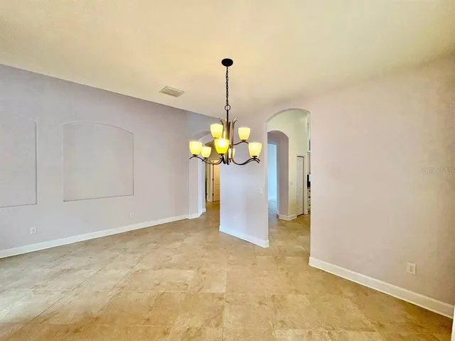 a view of a room with a chandelier