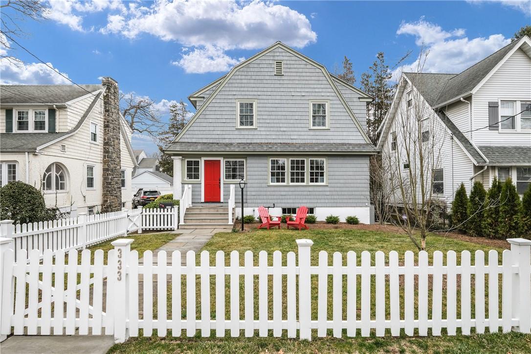 333 Rye Beach Avenue Rye, NY 10580 - Photo 1 of 1 a front view of white house with a small yard
