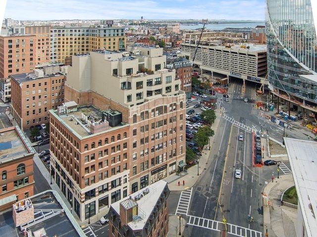 a view of city with tall buildings