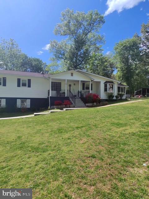 12601 Livingston Road Fort Washington, MD 20744 - Photo 23 of 26 front view of a house with a yard
