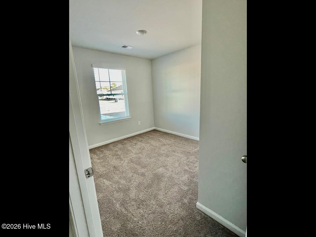 1025 Course Lane Holly Ridge, NC 28445 - Photo 13 of 19 Bedroom 2
