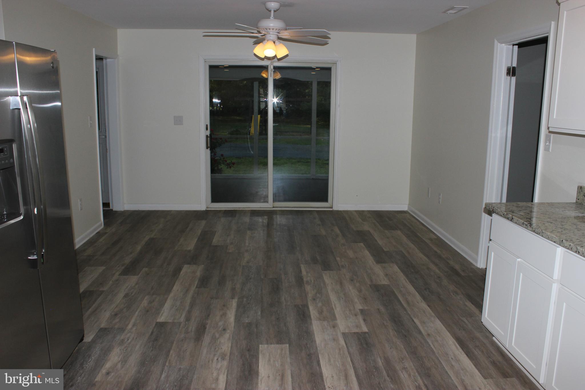 5205 Cooper Road Eden, MD 21822 - Photo 19 of 26 Kitchen view to dining room to porch