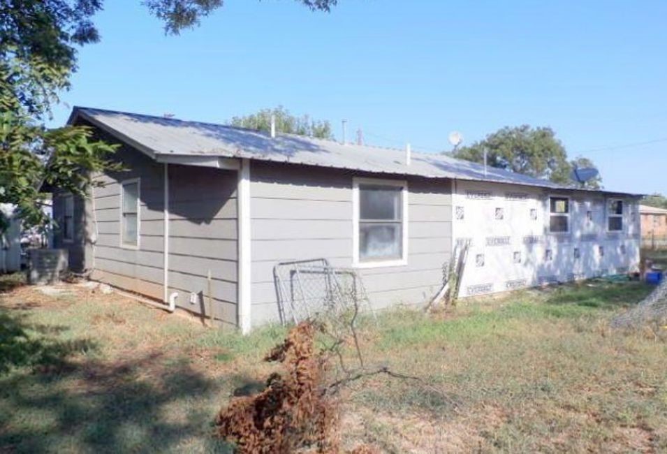 707 First Street Bangs, TX 76823 - Photo 3 of 9 a view of a backyard