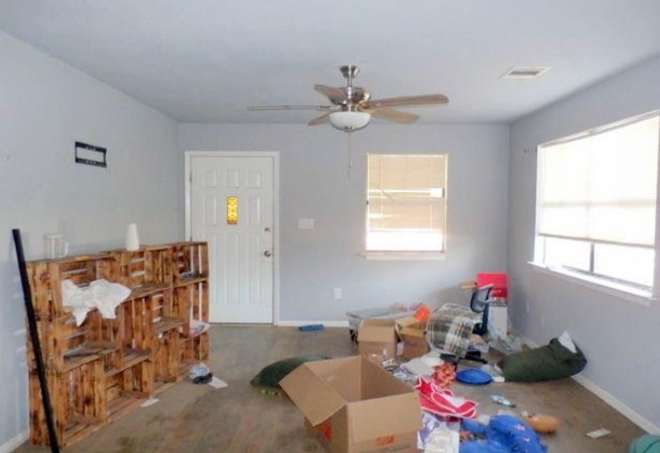 707 First Street Bangs, TX 76823 - Photo 4 of 9 a living room with furniture and a window