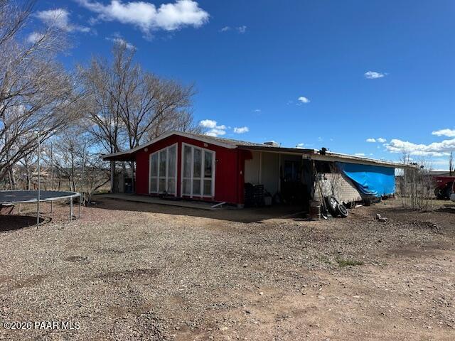 2715 West Annie Road Paulden, AZ 86334 - Photo 2 of 10 a view of a house with a yard covered in snow