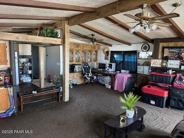2715 West Annie Road Paulden, AZ 86334 - Photo 4 of 10 a living room with furniture gym equipment and a large window