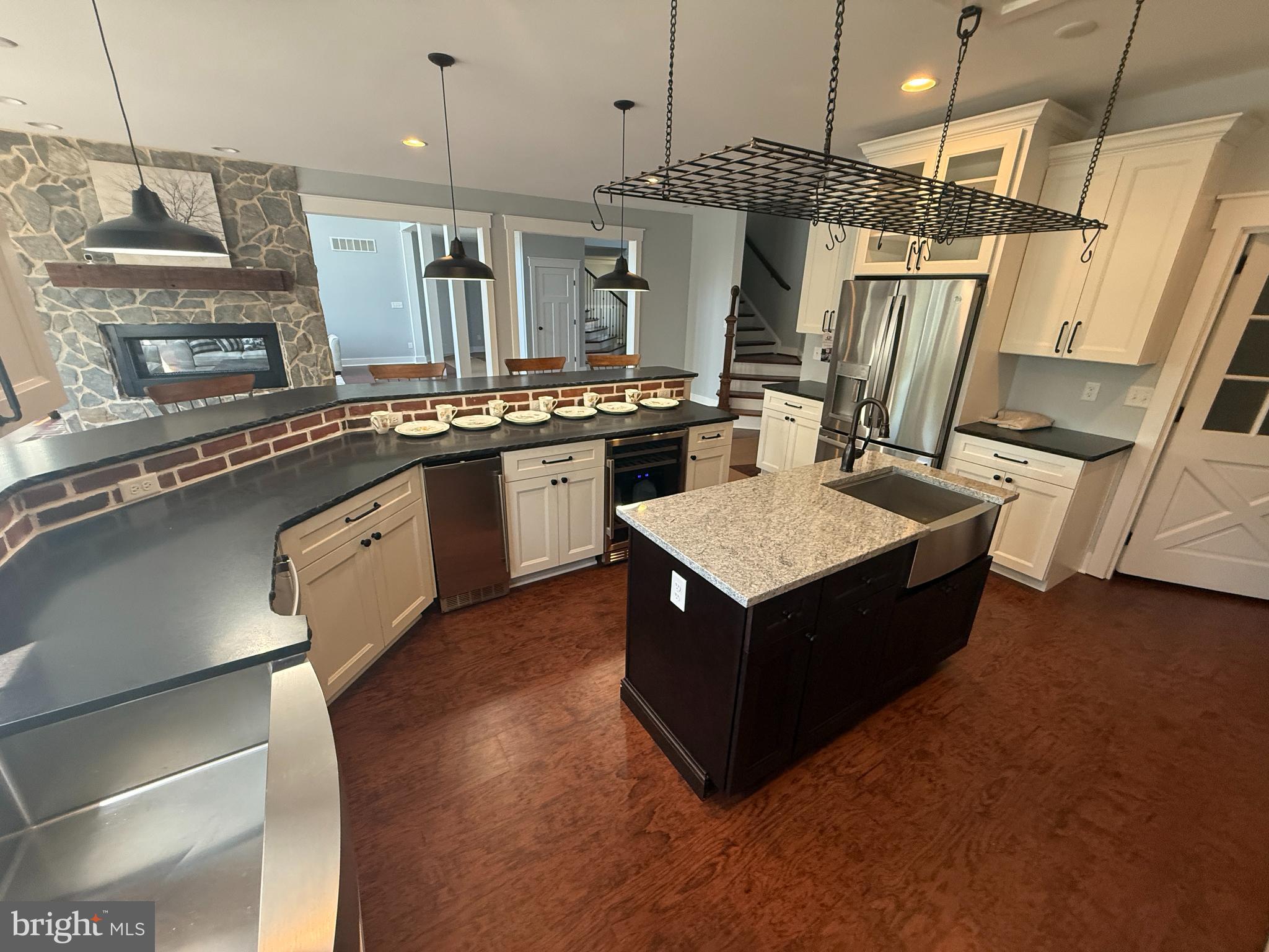 5482 Summit Bridge Road Townsend, DE 19734 - Photo 11 of 43 a kitchen with granite countertop a sink counter top space appliances and cabinets