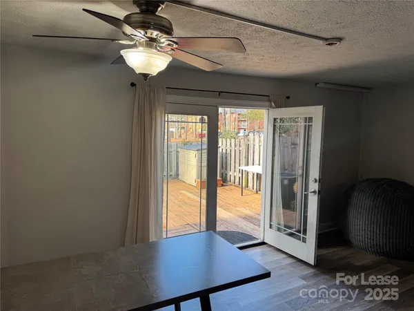 a view of a hallway with a chandelier