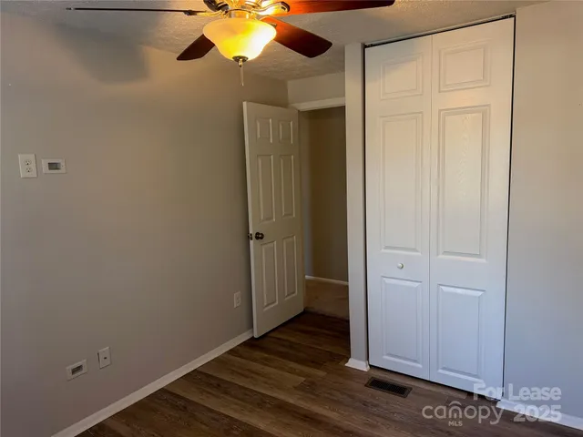 a view of a backyard with wooden floor