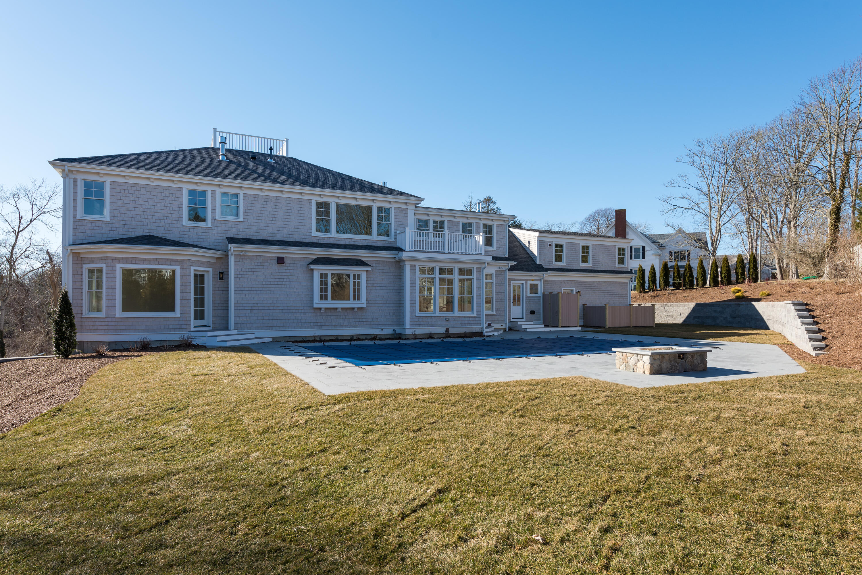 84 Doane Road Chatham, MA 02633 - Photo 3 of 11 a front view of a house with a yard