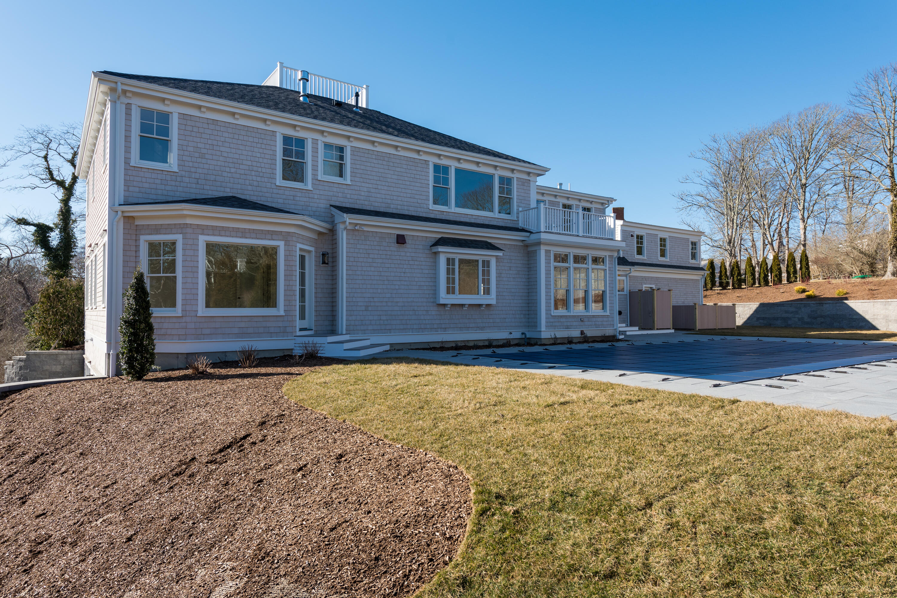 84 Doane Road Chatham, MA 02633 - Photo 4 of 11 a front view of a house with a yard