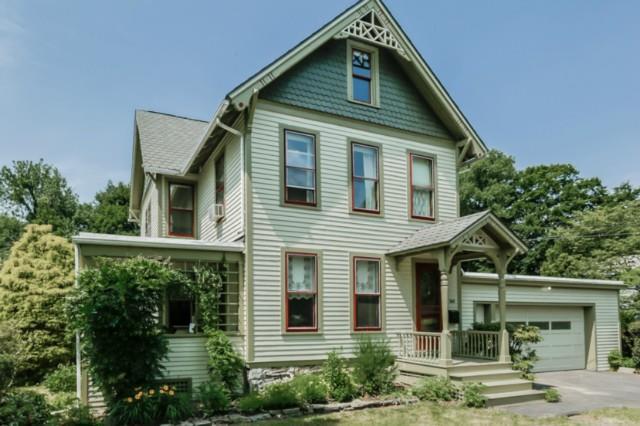 a front view of a house with a porch