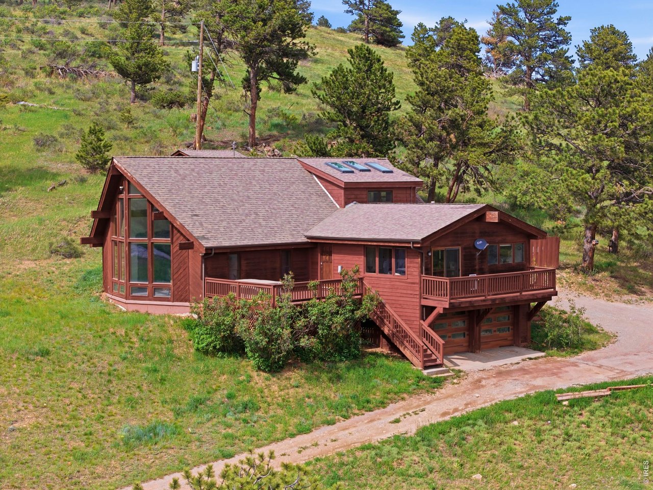 8238 Sugarloaf Road Boulder, CO 80302 - Photo 4 of 45 2 decks and an established Lilac bush that blooms bright purple in May