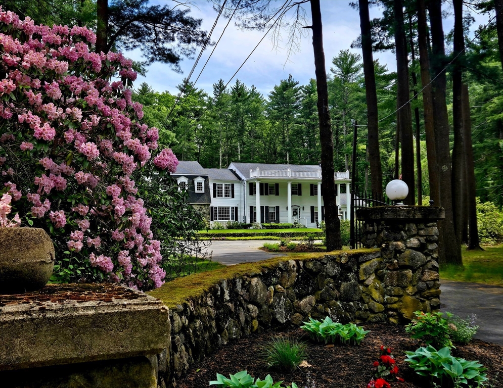 28 Pineswamp Road Ipswich, MA 01938 - Photo 3 of 42 a view of a house with a yard and garden