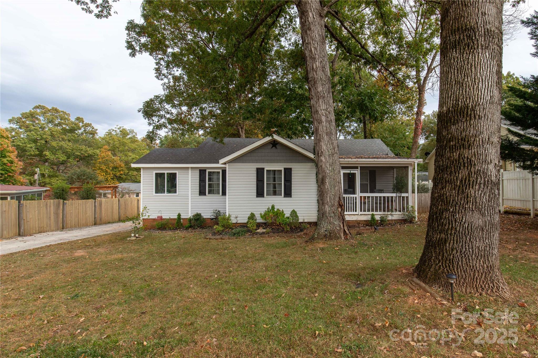 602 Unity Street Fort Mill, SC 29715 - Photo 1 of 48 a view of a house with a yard
