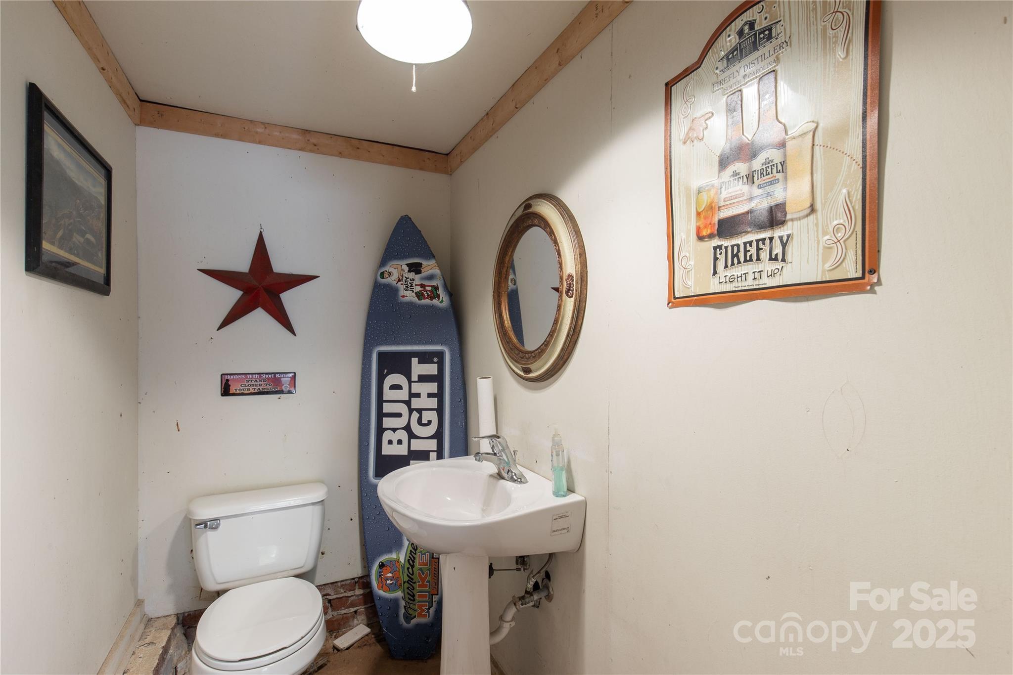 602 Unity Street Fort Mill, SC 29715 - Photo 11 of 48 a bathroom with a toilet sink and mirror