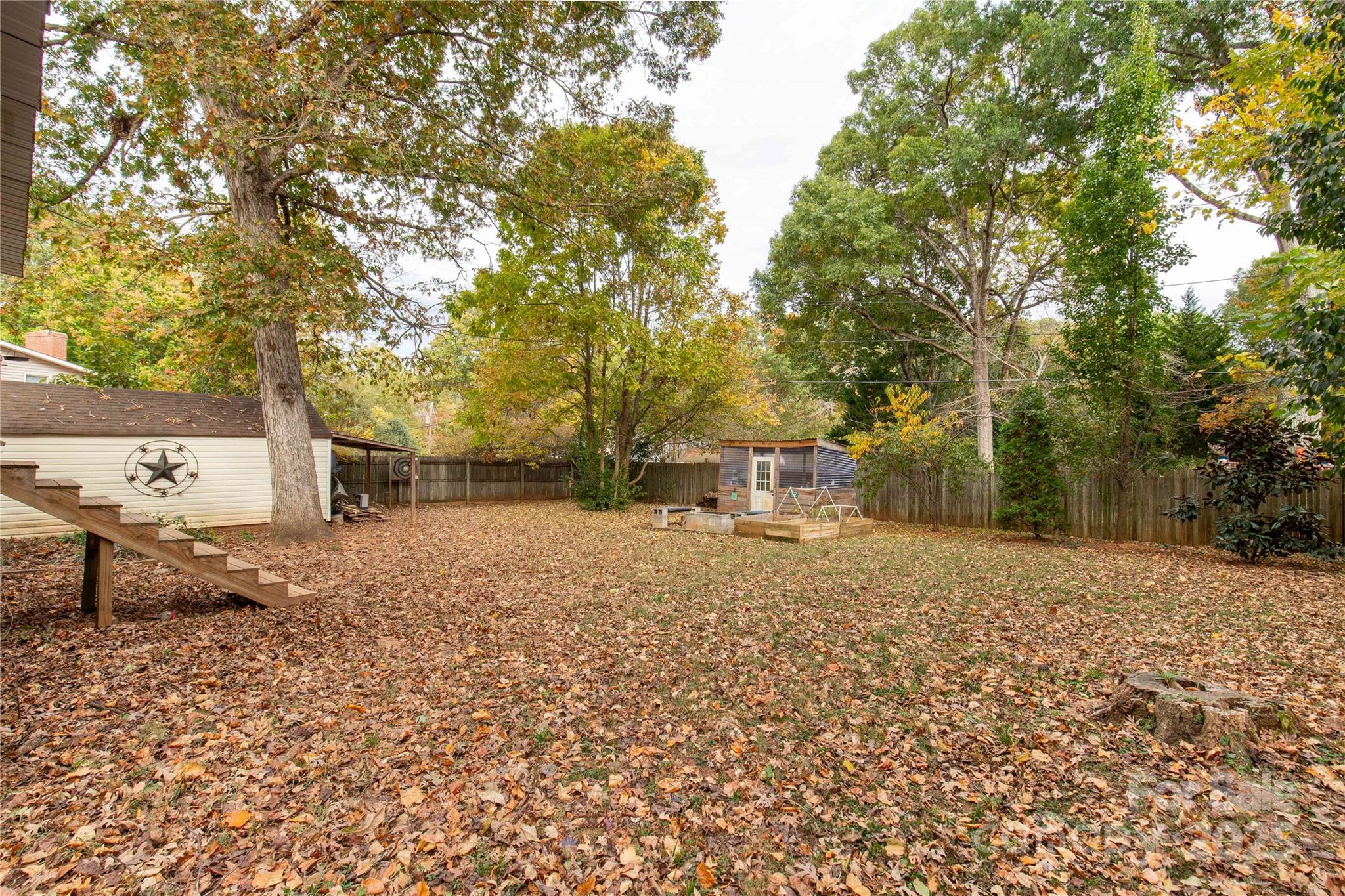 602 Unity Street Fort Mill, SC 29715 - Photo 17 of 48 a house with trees in the background