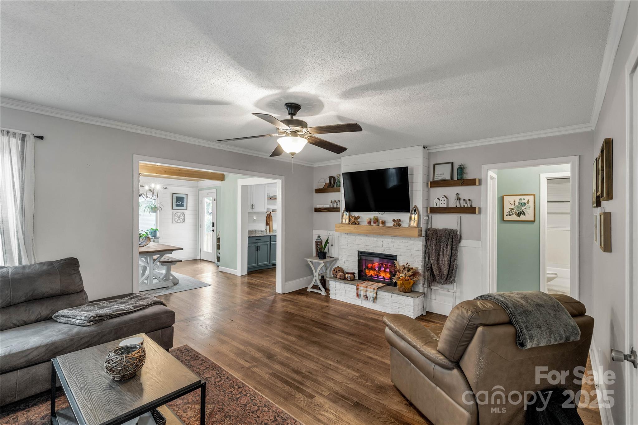 602 Unity Street Fort Mill, SC 29715 - Photo 22 of 48 a living room with furniture and a flat screen tv