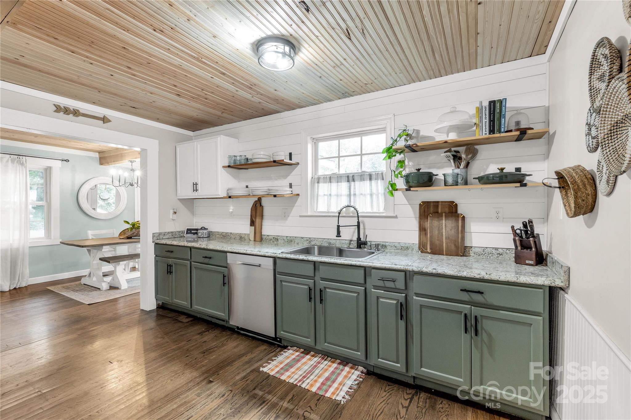 602 Unity Street Fort Mill, SC 29715 - Photo 32 of 48 a kitchen with lots of counter top space and wooden floor