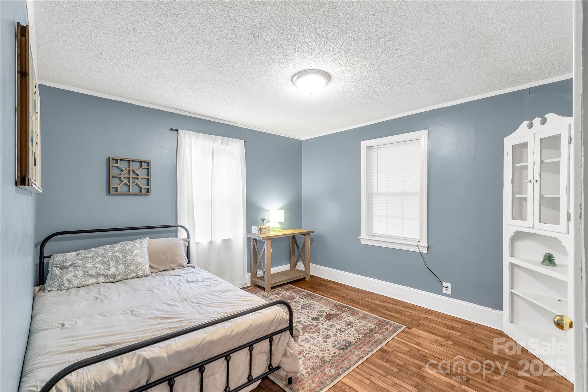 602 Unity Street Fort Mill, SC 29715 - Photo 35 of 48 a bedroom with a large bed and a window