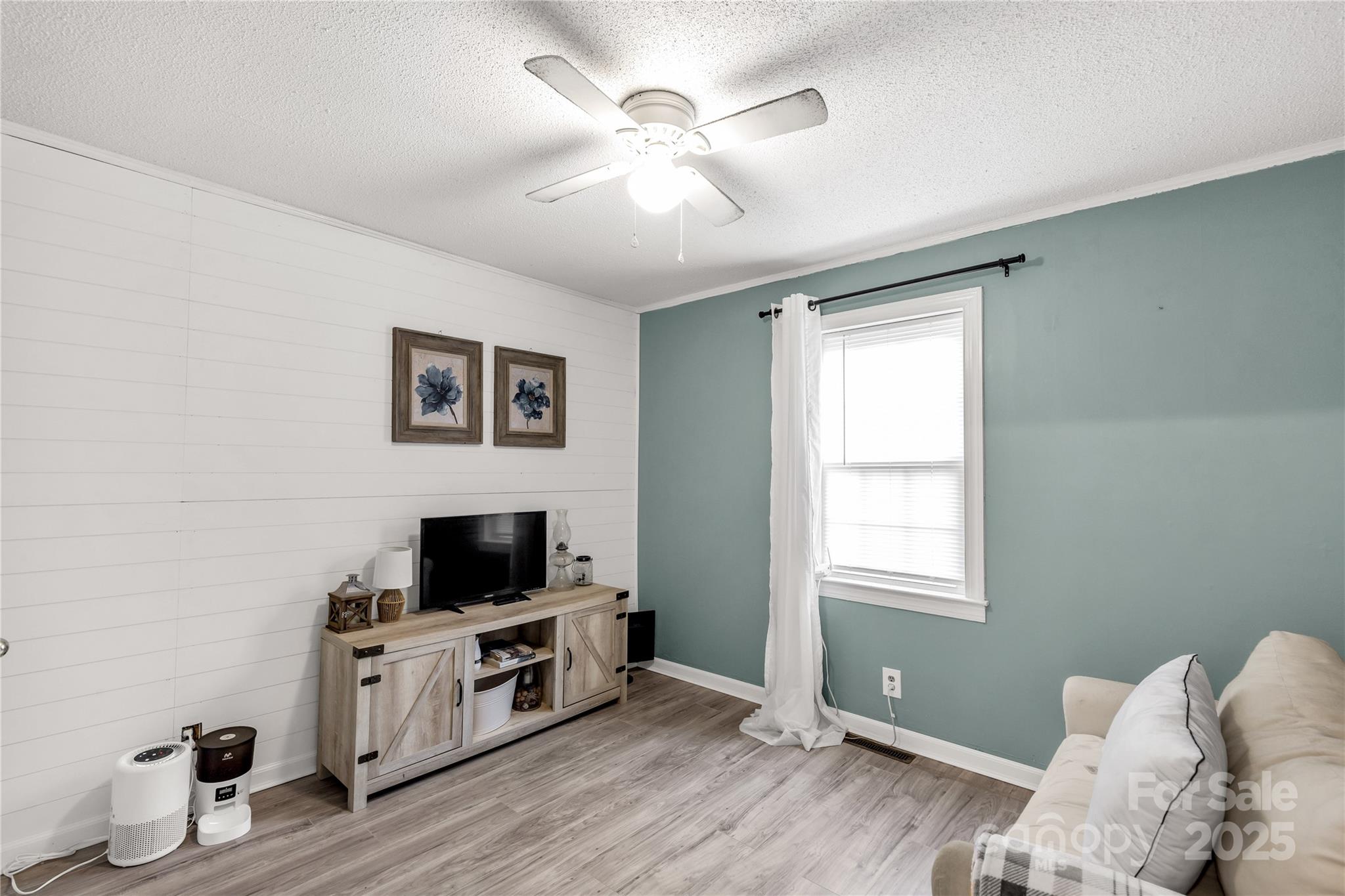 602 Unity Street Fort Mill, SC 29715 - Photo 37 of 48 a living room with furniture and a flat screen tv