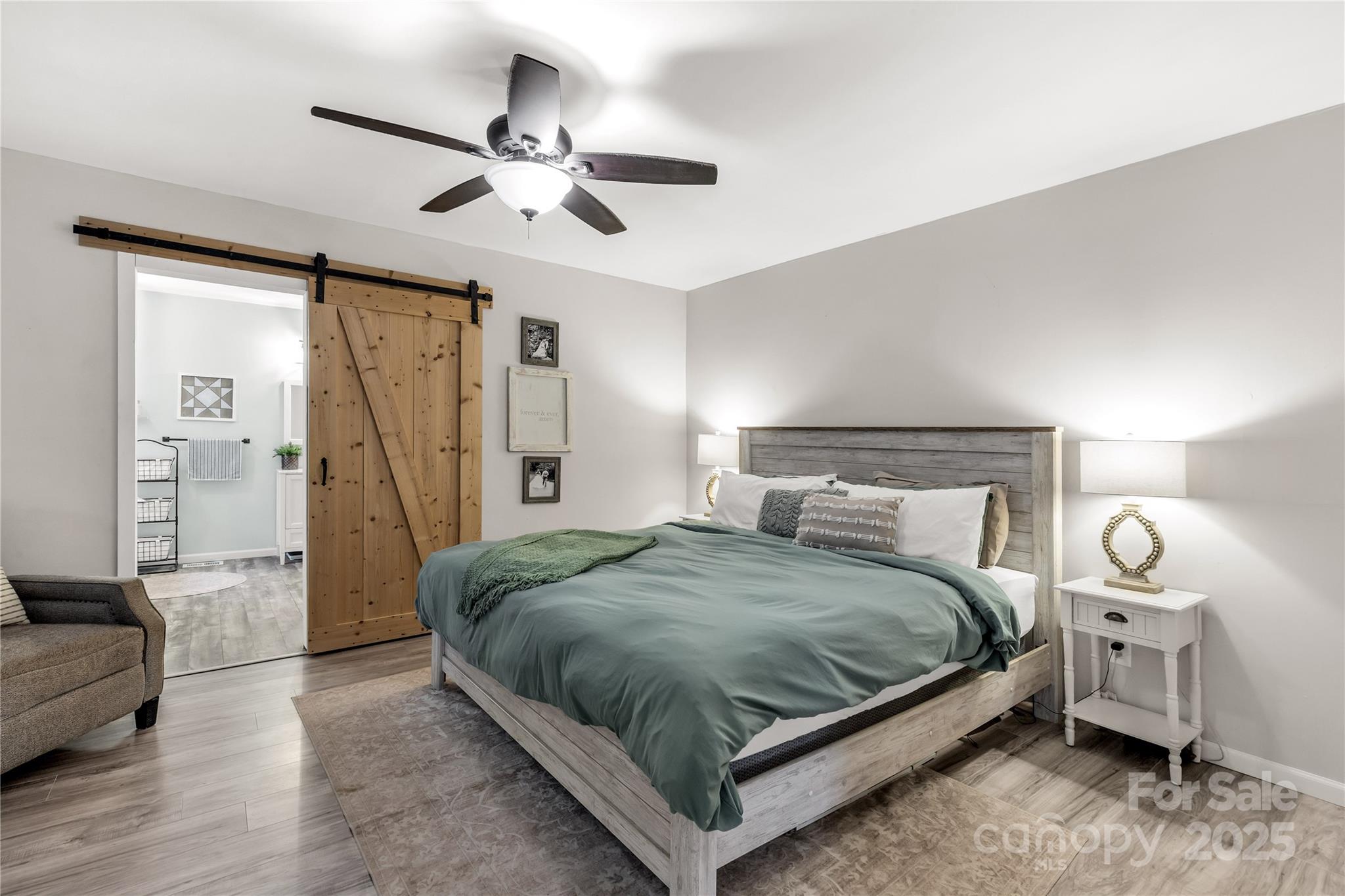 602 Unity Street Fort Mill, SC 29715 - Photo 42 of 48 a bedroom with a bed and a couch