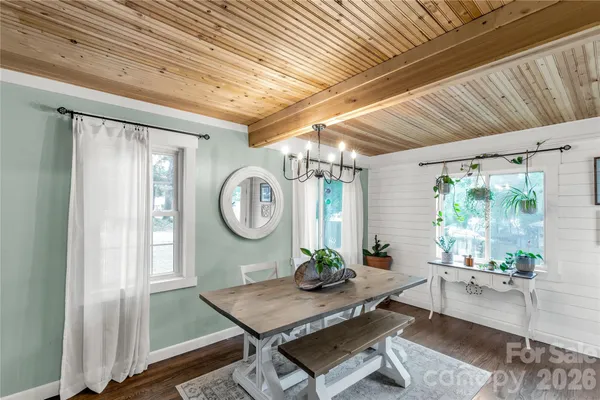 a room with furniture and a large window