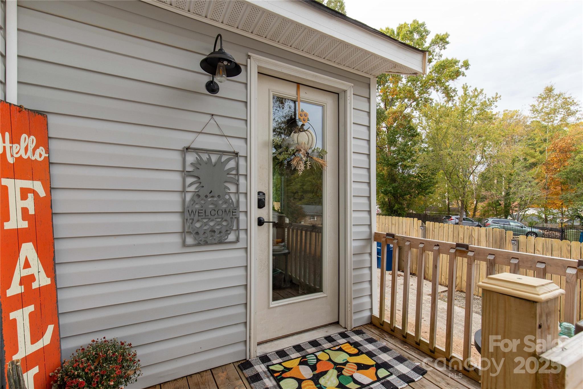 602 Unity Street Fort Mill, SC 29715 - Photo 8 of 48 a view of a balcony with a potted plant