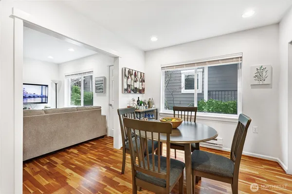 a view of a dining room with furniture window and outside view