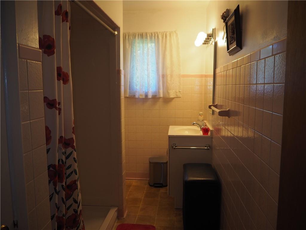 420 Saxonburg Road Butler, PA 16002 - Photo 15 of 26 a bathroom with a sink and mirror