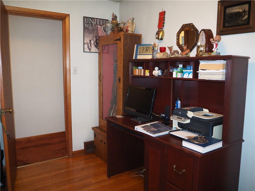 420 Saxonburg Road Butler, PA 16002 - Photo 17 of 26 a room with furniture and wooden floor
