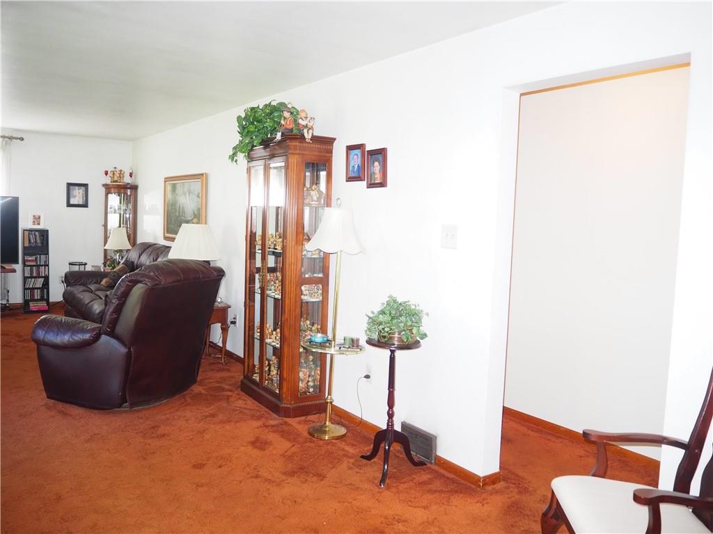 420 Saxonburg Road Butler, PA 16002 - Photo 3 of 26 a living room with furniture and a flat screen tv