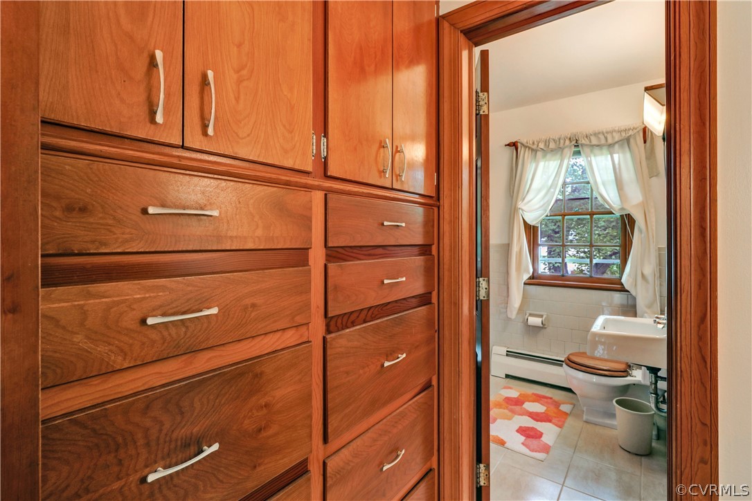3700 Beulah Road Richmond, VA 23237 - Photo 25 of 33 Hall Bath with Built-in Drawers and Cabinetry