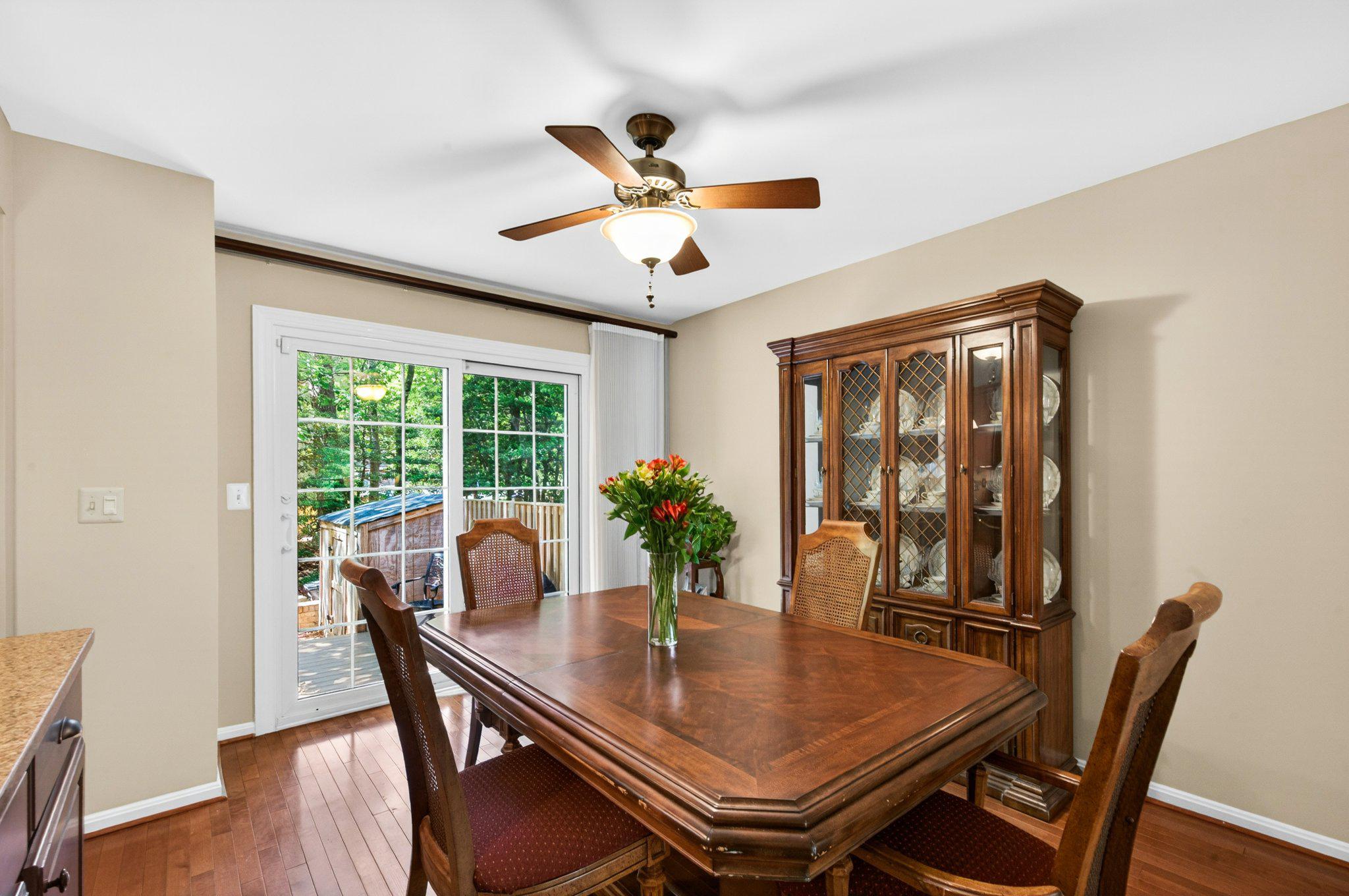 11737 Dry River Court Reston, VA 20191 - Photo 11 of 45 a view of a dining room with furniture window and wooden floor