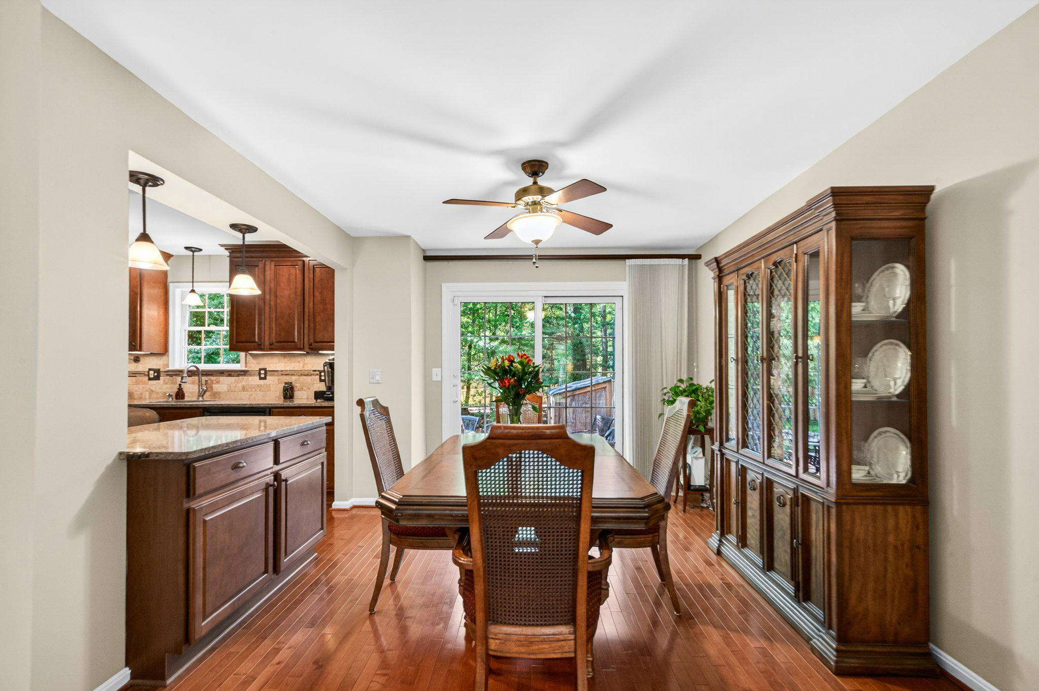11737 Dry River Court Reston, VA 20191 - Photo 12 of 45 a view of a dining room with furniture window and wooden floor