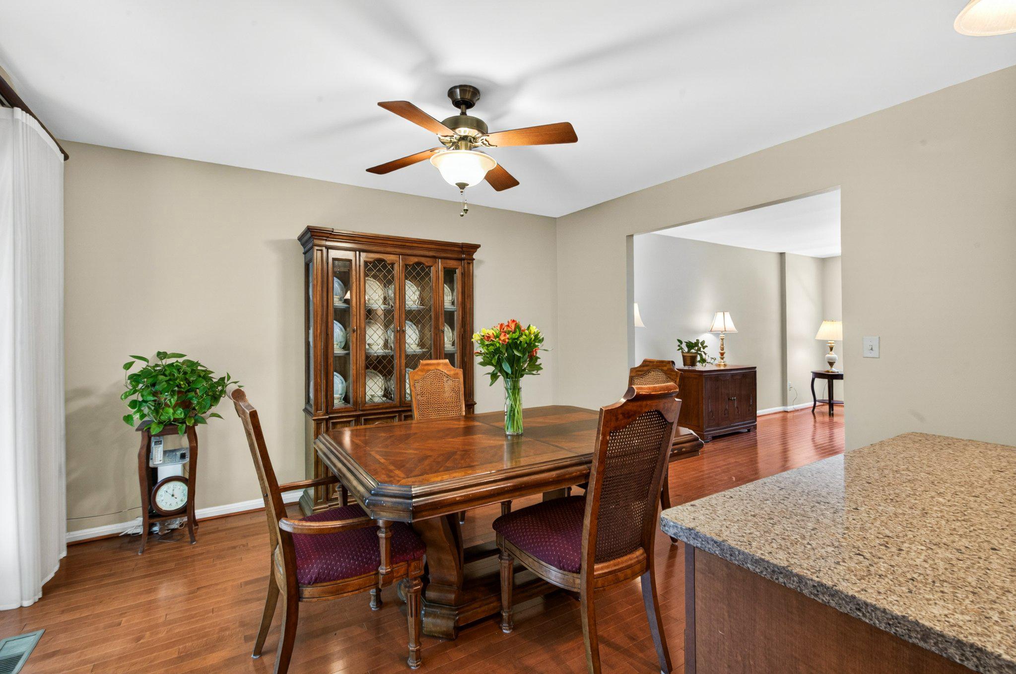 11737 Dry River Court Reston, VA 20191 - Photo 13 of 45 a dining room with furniture and window