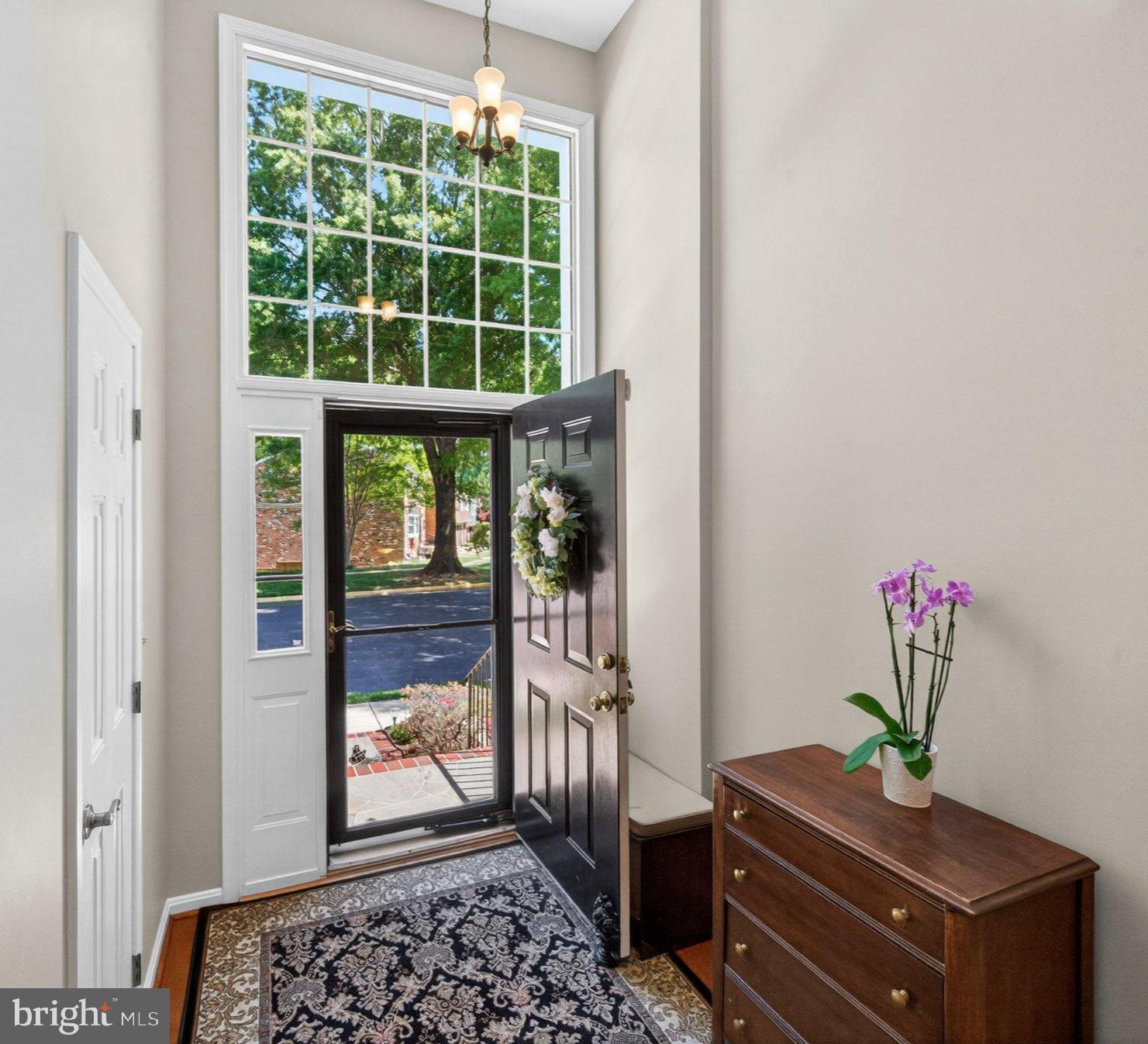 11737 Dry River Court Reston, VA 20191 - Photo 2 of 45 a room with furniture and a potted plant