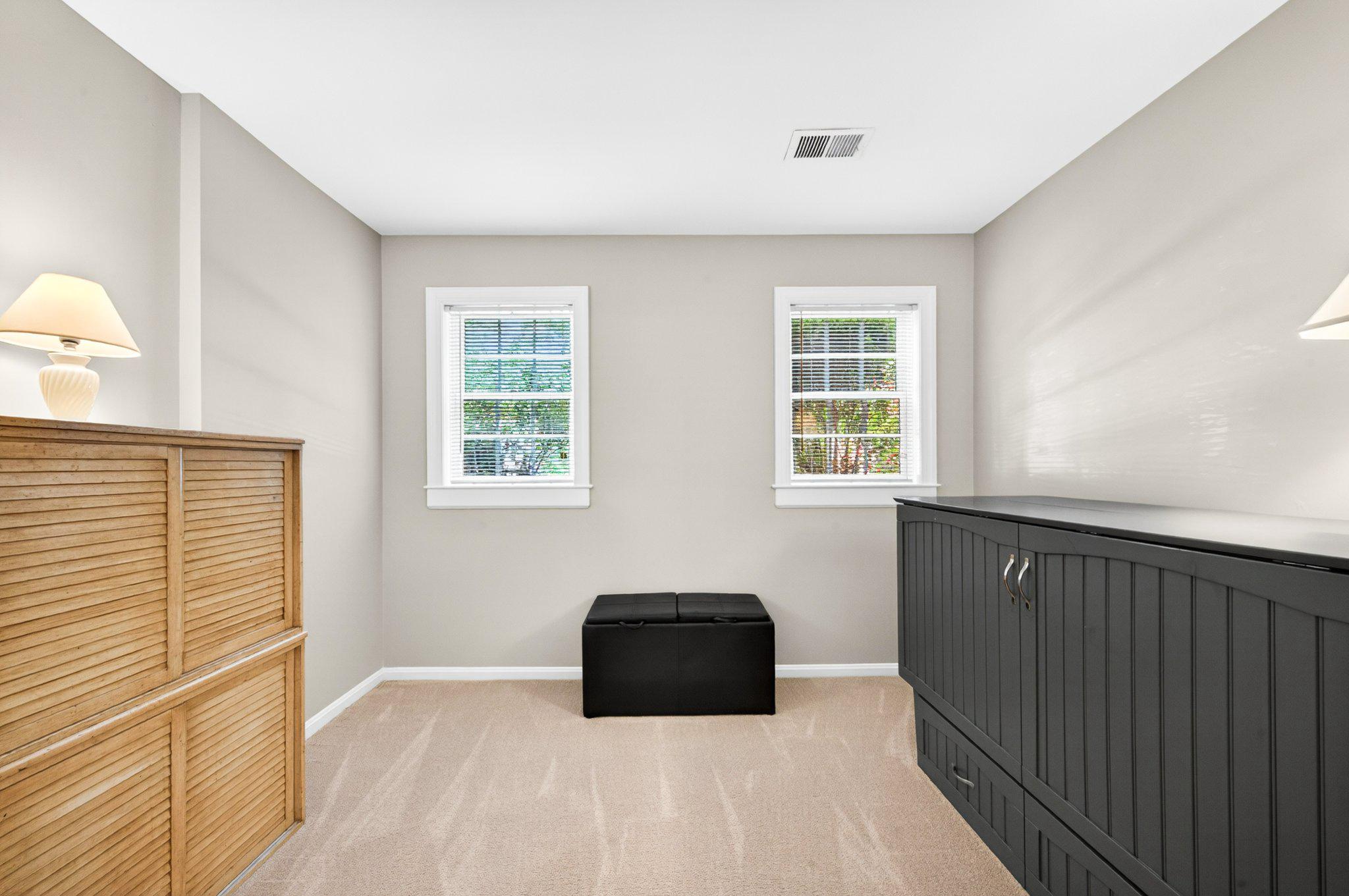 11737 Dry River Court Reston, VA 20191 - Photo 29 of 45 a bedroom with a bed and a window
