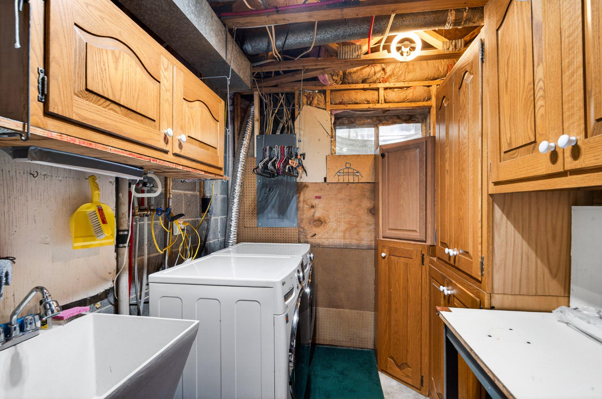 11737 Dry River Court Reston, VA 20191 - Photo 30 of 45 a utility room with dryer and washer