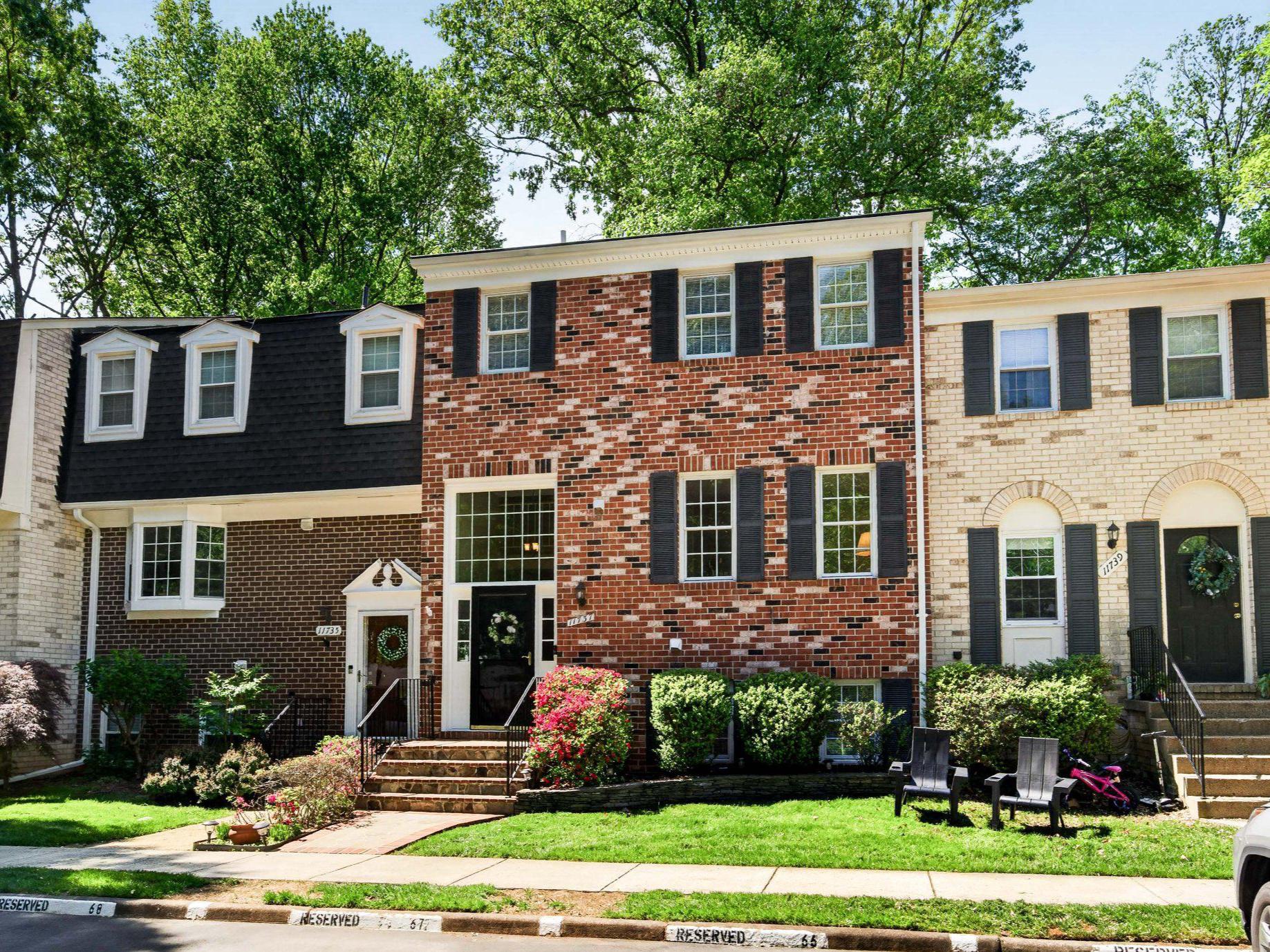 11737 Dry River Court Reston, VA 20191 - Photo 36 of 45 a front view of a house with a yard and trees