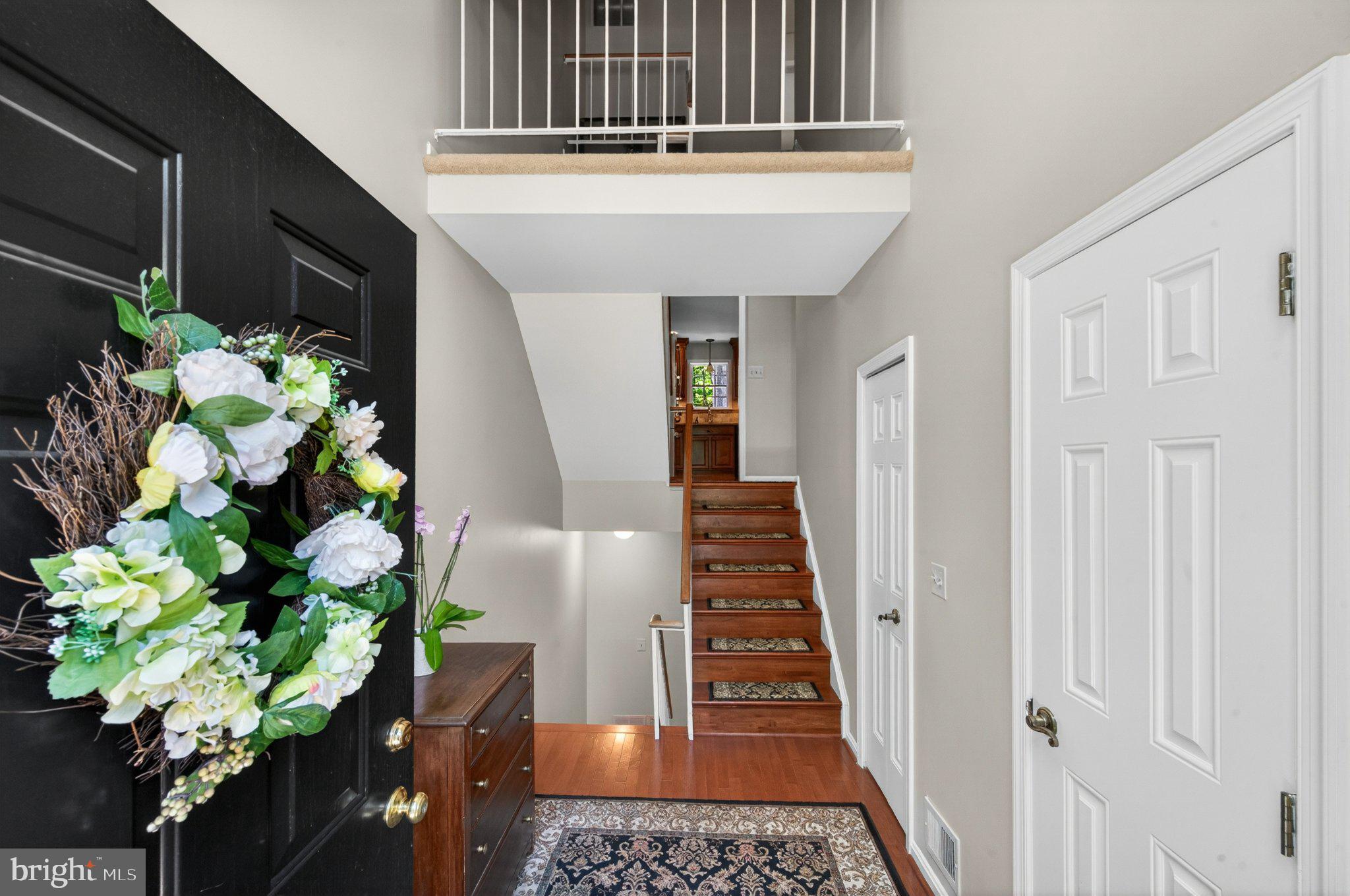11737 Dry River Court Reston, VA 20191 - Photo 37 of 45 a view of entryway with wooden floor