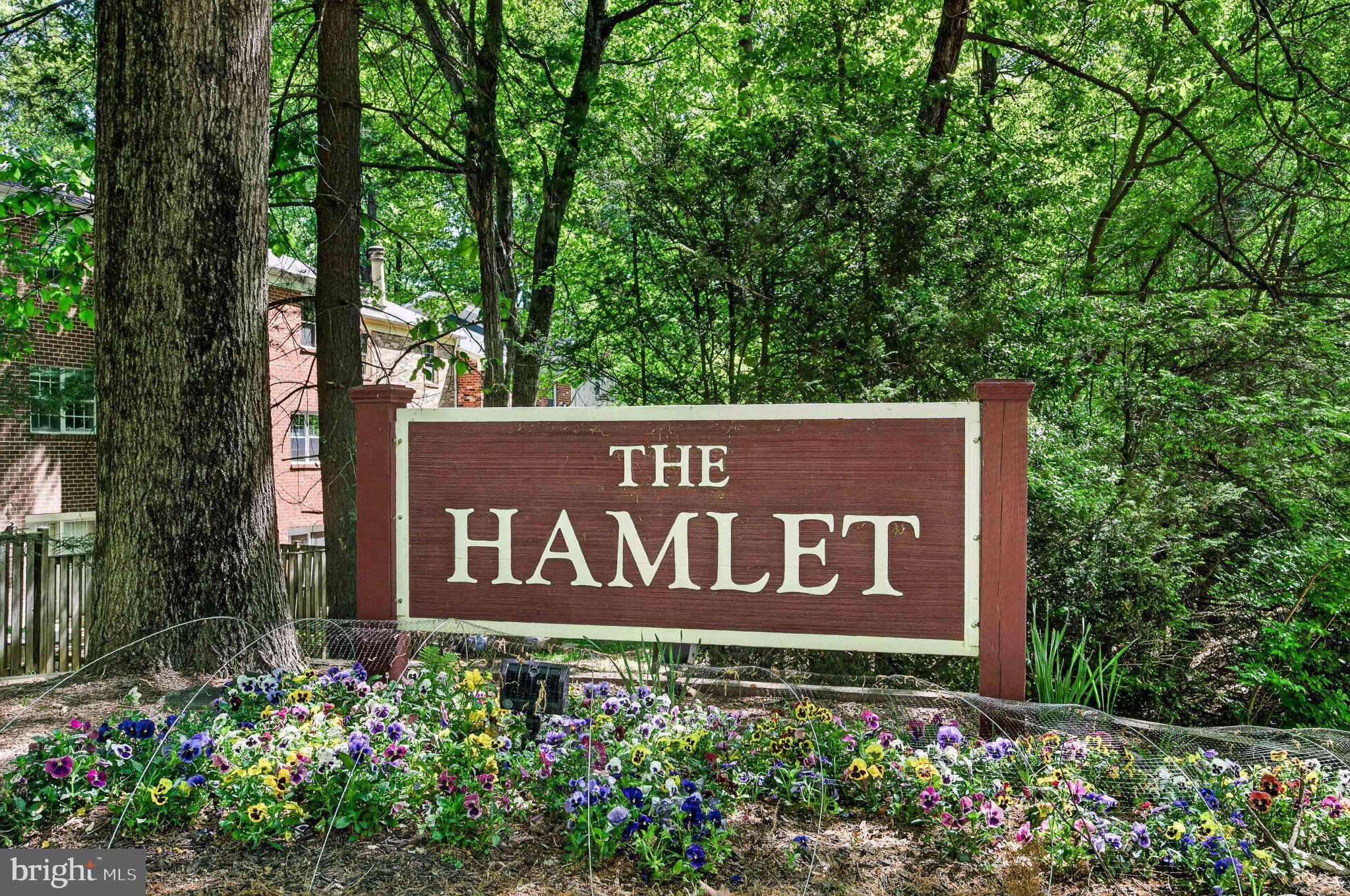 11737 Dry River Court Reston, VA 20191 - Photo 39 of 45 a sign broad in front of flowers