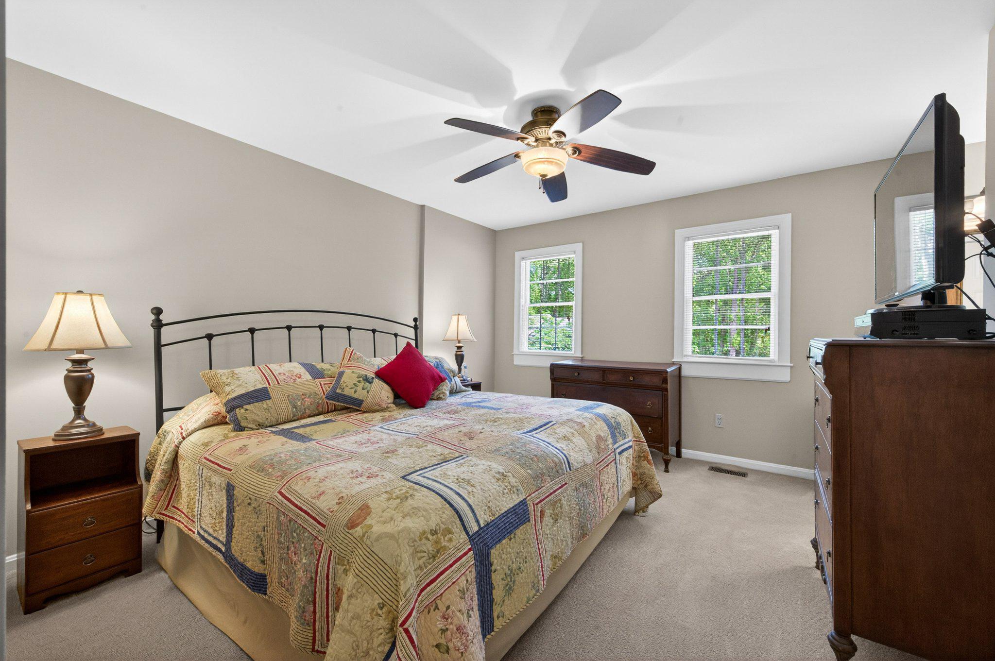 11737 Dry River Court Reston, VA 20191 - Photo 4 of 45 a bedroom with a bed and window
