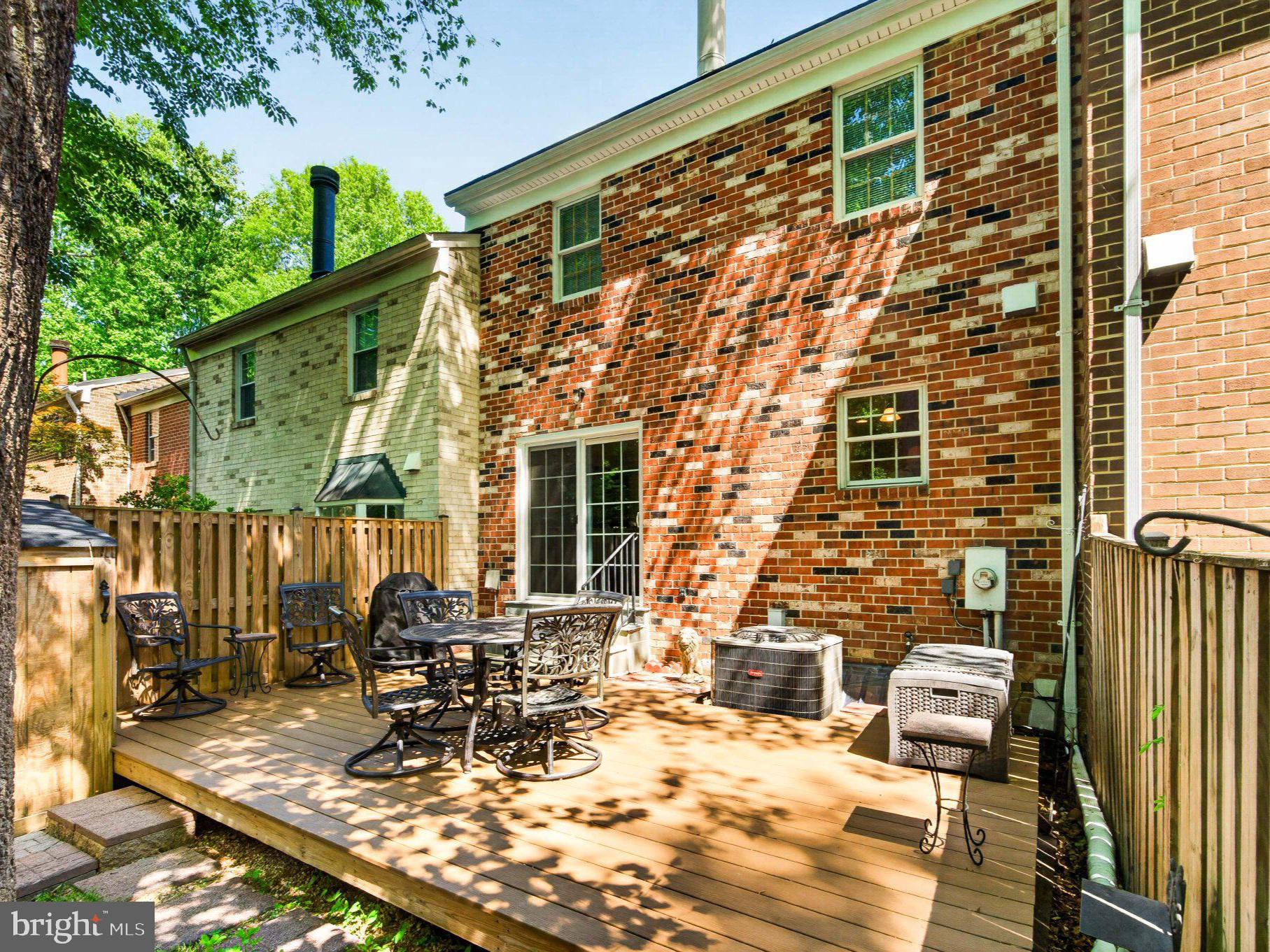 11737 Dry River Court Reston, VA 20191 - Photo 5 of 45 a view of a dinning tables and chairs in patio