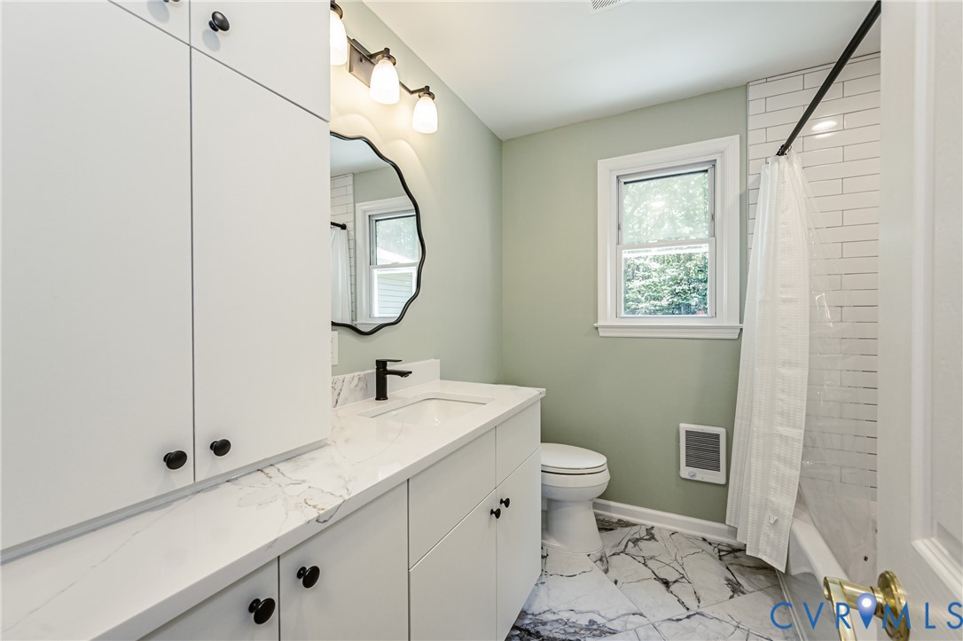 16110 Rowlett Road Chesterfield, VA 23838 - Photo 18 of 23 Hall Bathroom with tub shower combo, extensive sto