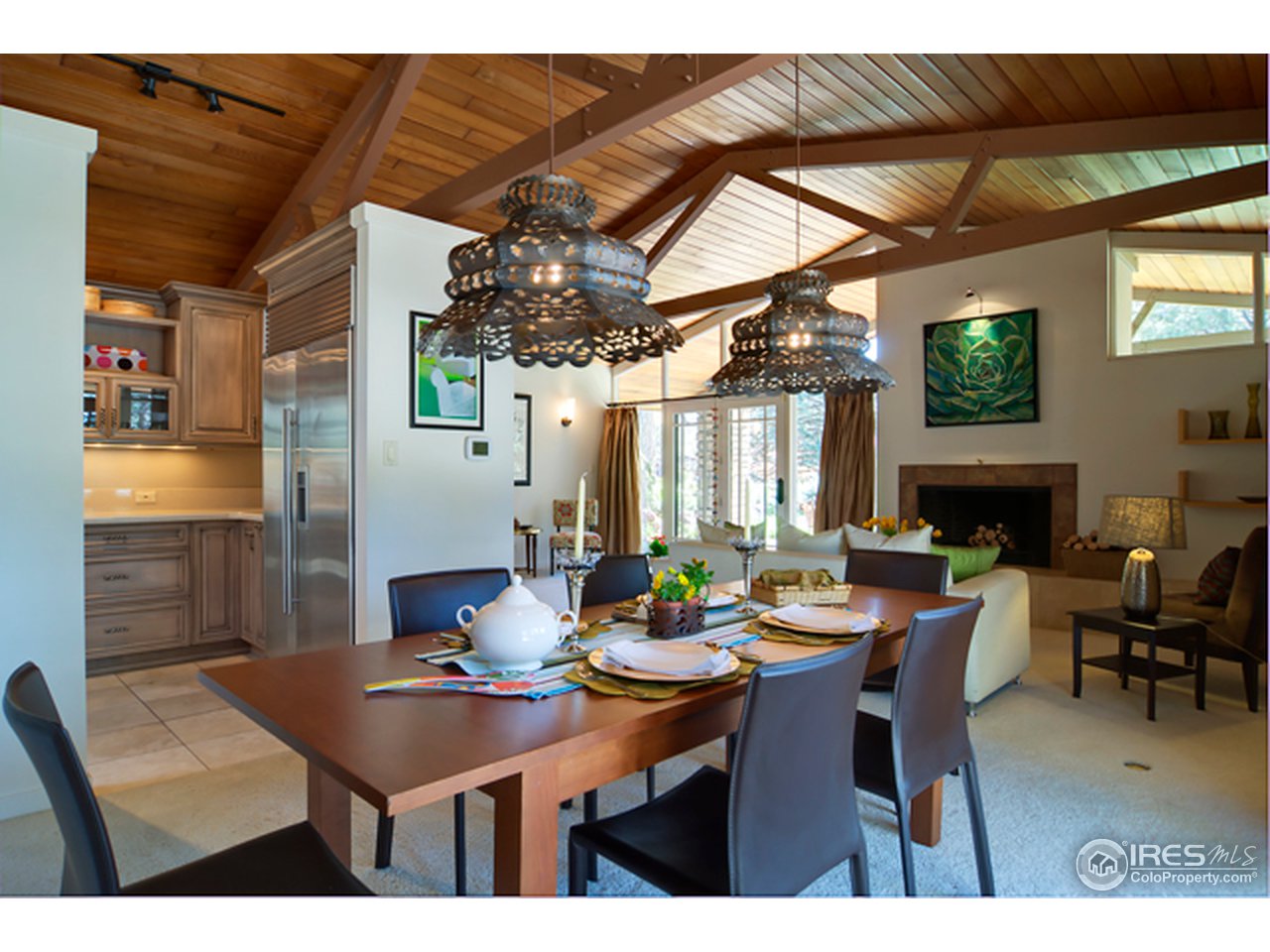 1270 Old Tale Road Boulder, CO 80303 - Photo 11 of 25 a dining room with a table and chairs