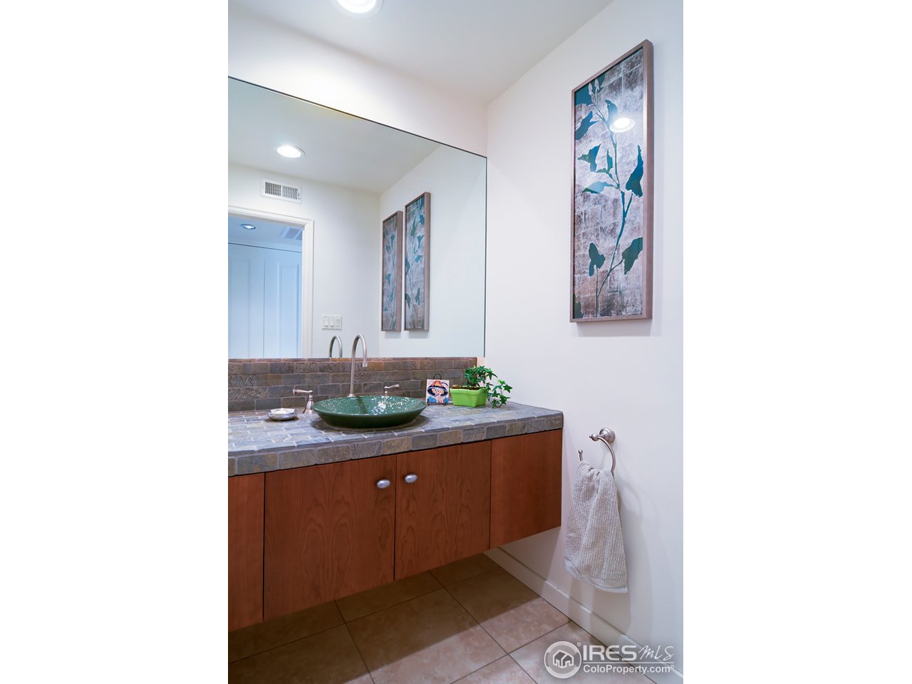 1270 Old Tale Road Boulder, CO 80303 - Photo 13 of 25 a bathroom with a sink and a mirror