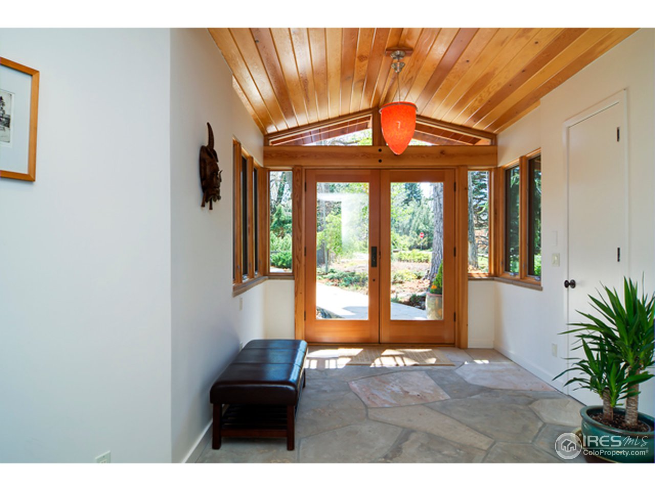 1270 Old Tale Road Boulder, CO 80303 - Photo 6 of 25 a front view of a house with entryway