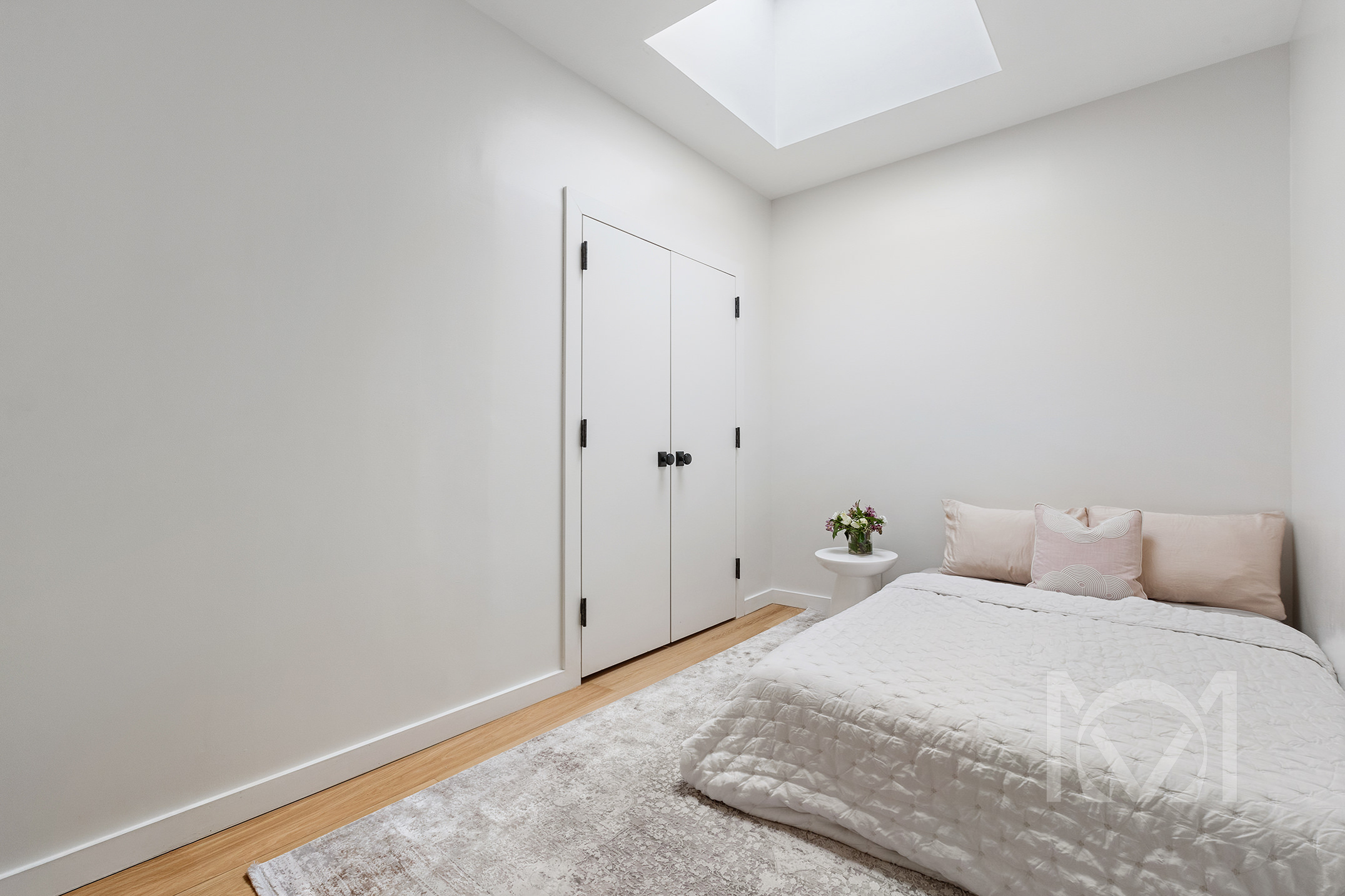 132 Remsen Street, Unit 12 Brooklyn, NY 11201 - Photo 5 of 8 a bedroom with a bed and hallway